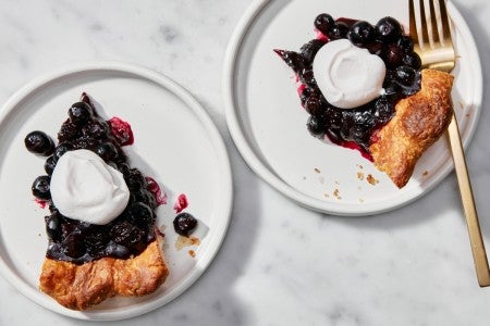 Two plater slices of Fresh Blueberry Pie