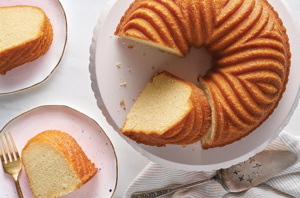 Bundt cake with several slices cut