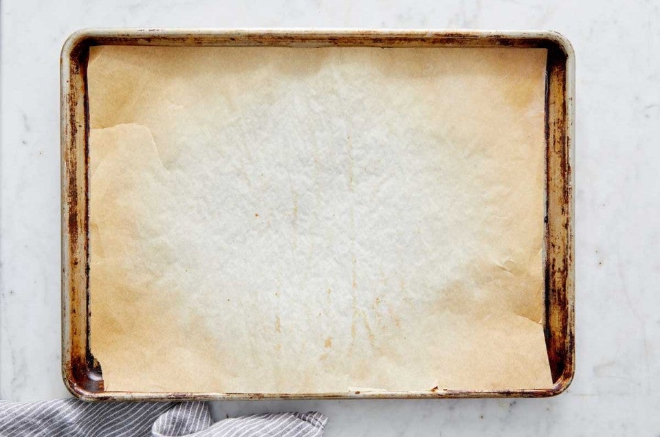 Parchment paper lined outlet baking sheet