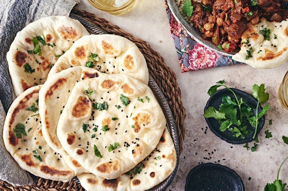 https://www.kingarthurbaking.com/sites/default/files/styles/featured_image/public/2021-02/naan-4.jpg?itok=WrlBChWU