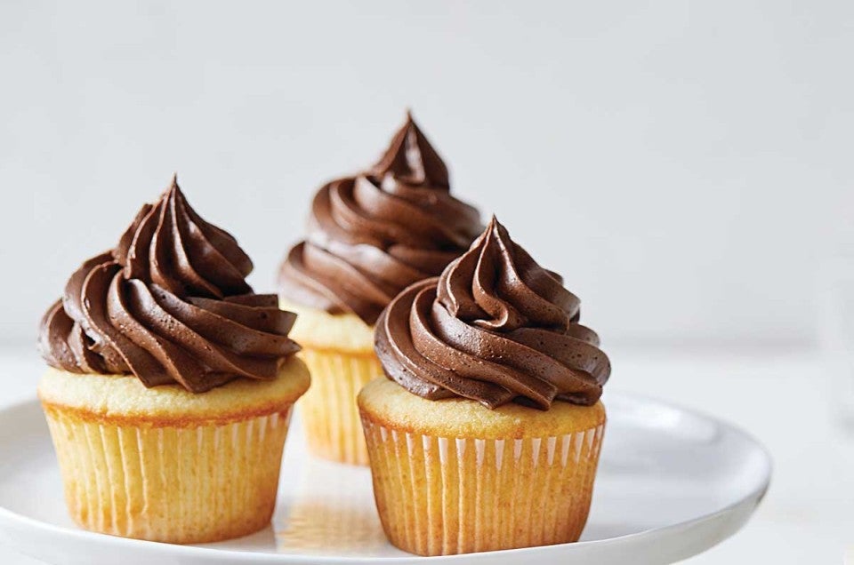 Vanilla cupcakes with chocolate frosting