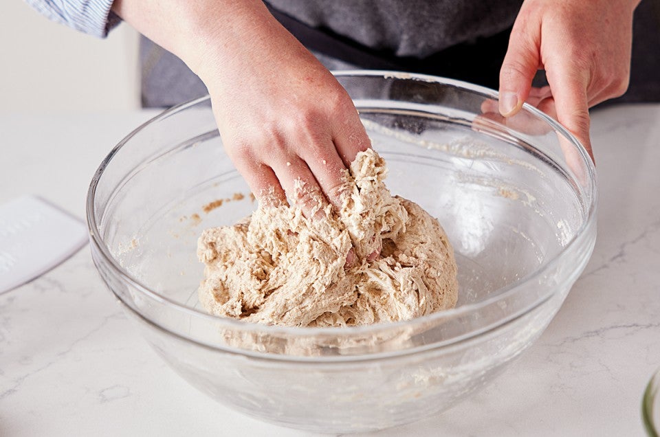 Mixing cookie deals dough by hand