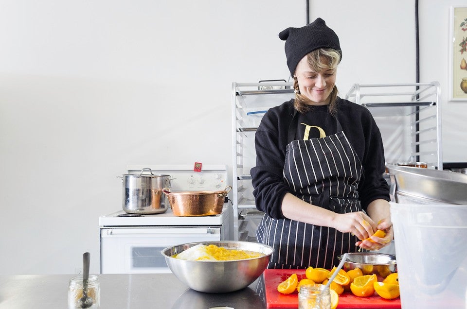 Camilla Wynne in the kitchen making preserves