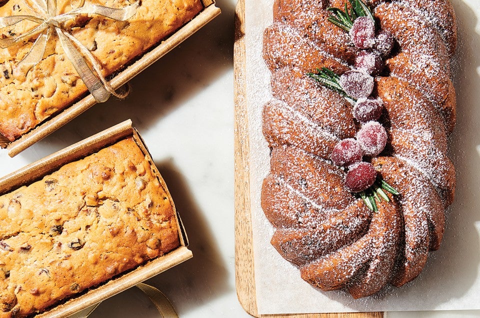 Sour Cream Fruitcake on cutting board and in bakeable paper pans - select to zoom