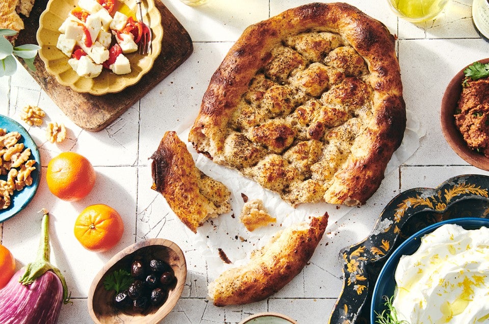 https://www.kingarthurbaking.com/sites/default/files/styles/featured_image/public/2022-10/matnakash-armenian-fingerprint-flatbread-3_0922.jpg?itok=zyyHACbS