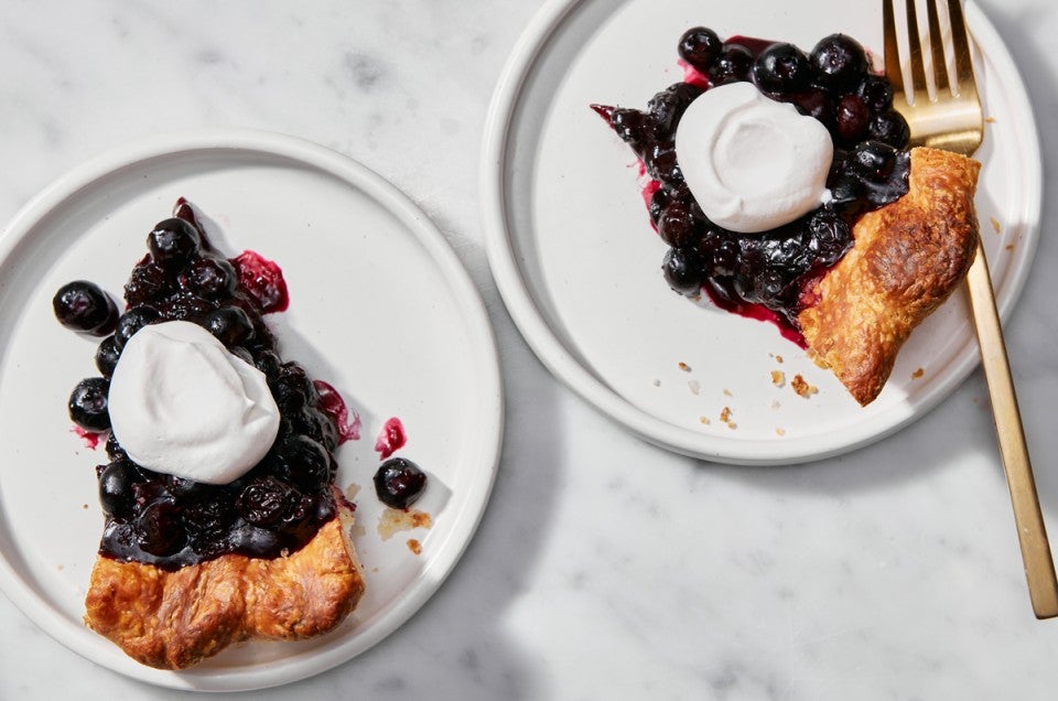 Two plater slices of Fresh Blueberry Pie