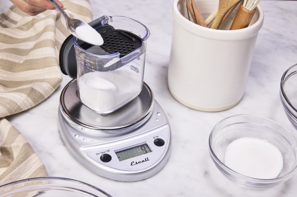 reverse taring technique on scale with sugar container