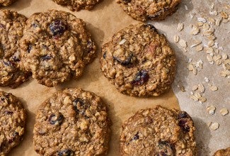 Oatmeal and Flax Cranberry Cookies on parchment