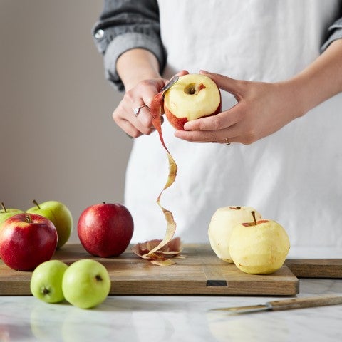 Baker peeling apples - select to zoom