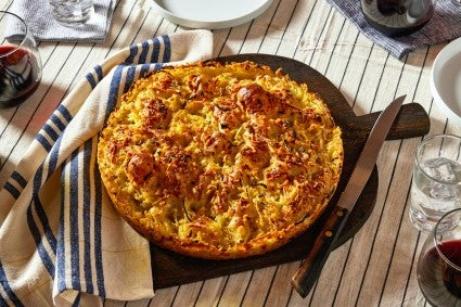 Baked latke focaccia on a cutting board