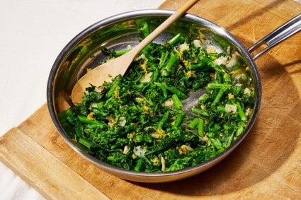 Cooking broccoli rabe in a skillet