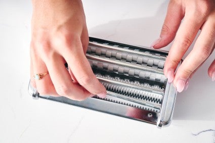 Pasta maker getting prepped to be cleaned