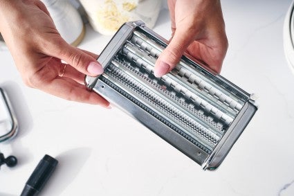 Pasta maker getting prepped to be cleaned