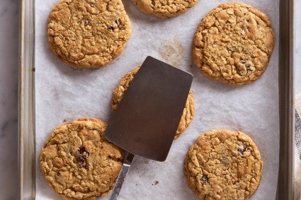 Breaking cookies with a metal spatula