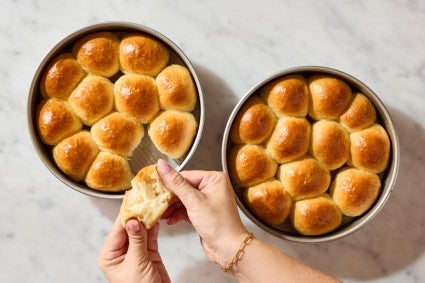 Baked rolls in their pans