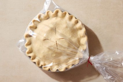 Unbaked pie in plastic bag for freezer