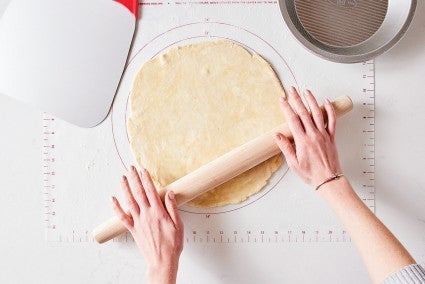 French rolling pin rolling out pie crust