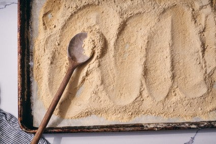 Toasted flour on a baking sheet