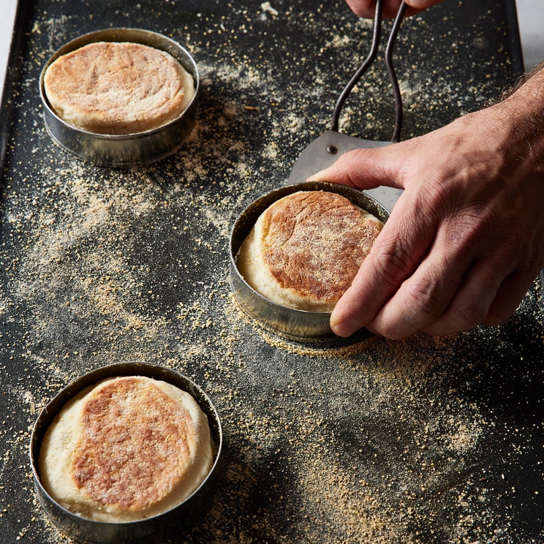 English muffins in baking rings